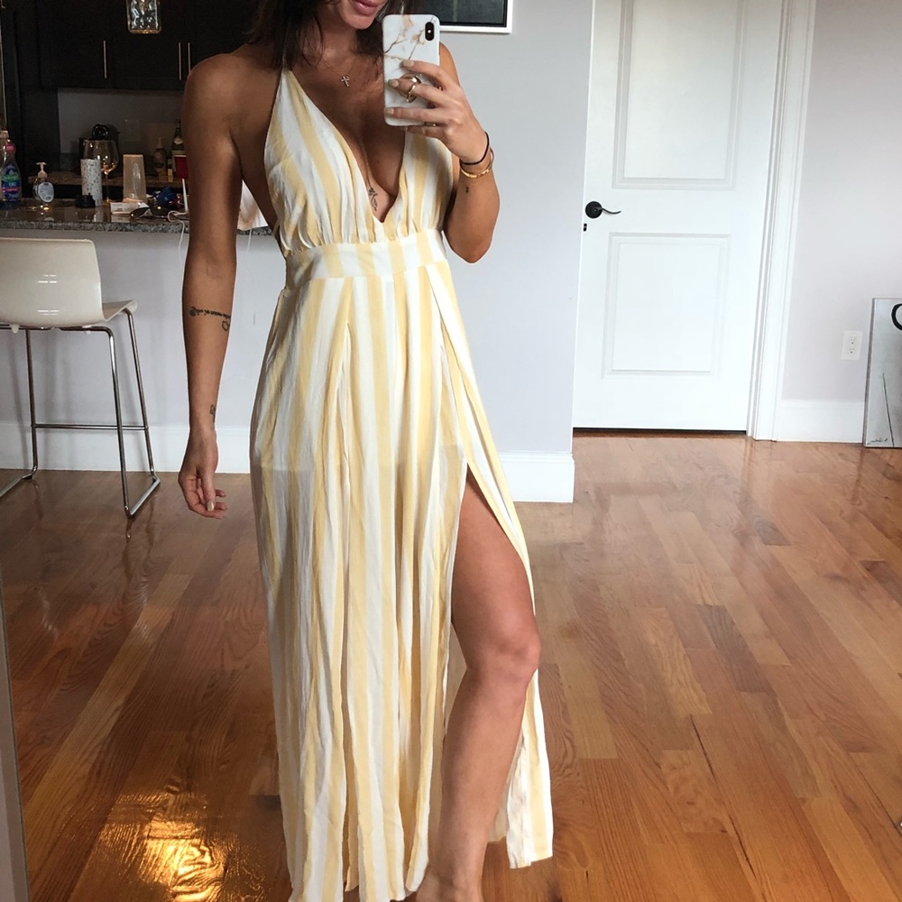 NWOT Yellow stripped, open leg/back jumpsuit